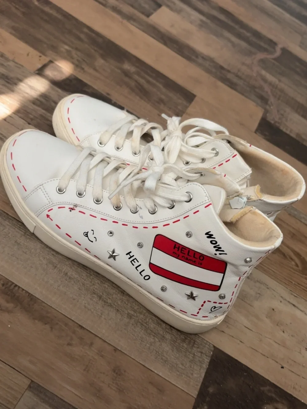Aldo White High-Top Sneakers with Red Stitch Detailing
